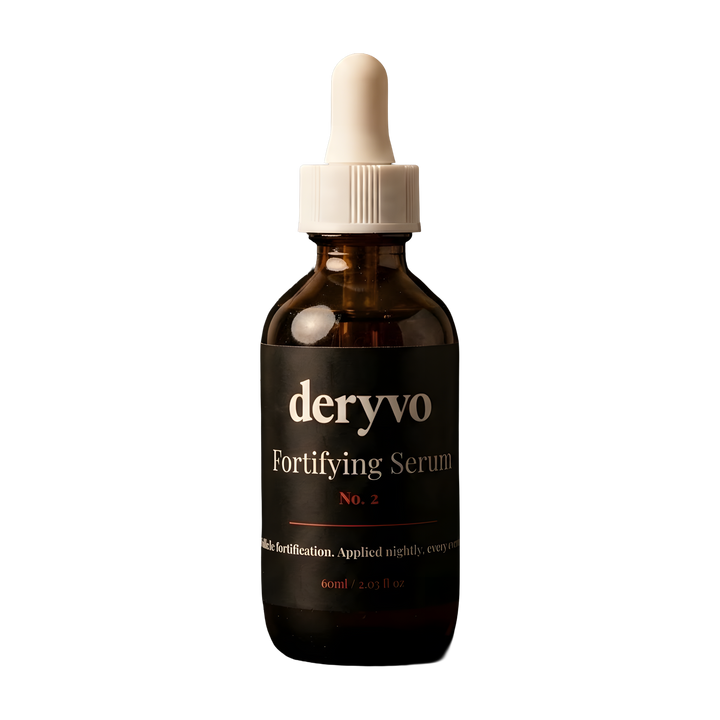 Scalp Fortification Oil — amber glass bottle, studio-lit on a near-black surface